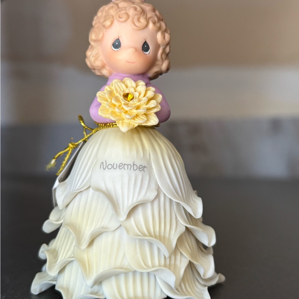 Precious Moments November Figurine with Yellow and Cream Dress